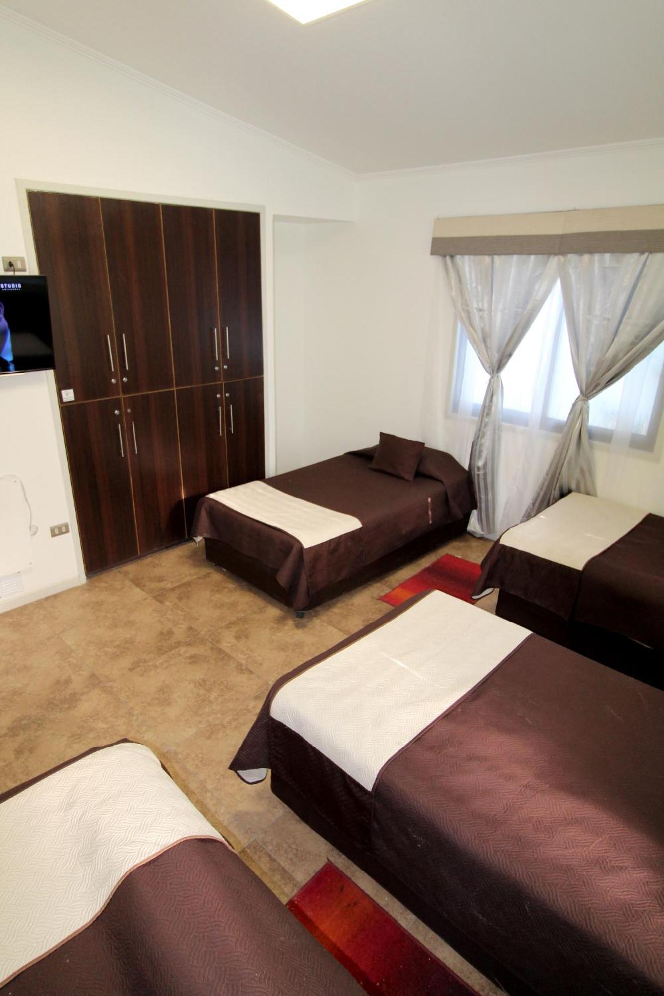 Juku Hostal Calama Bagian luar foto